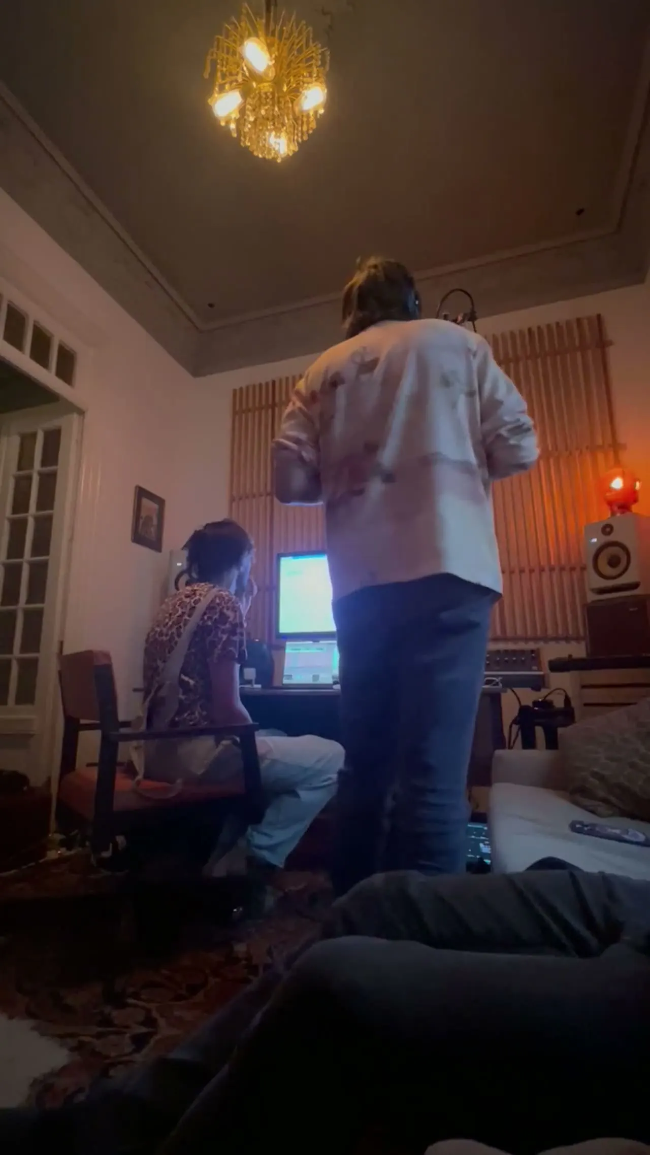 Jo.Ke making music with a collaborator in the studio